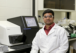 Sagar Utturkar, coauthor of high-rating biotechnology paper, in the team's Oak Ridge National Laboratory lab.