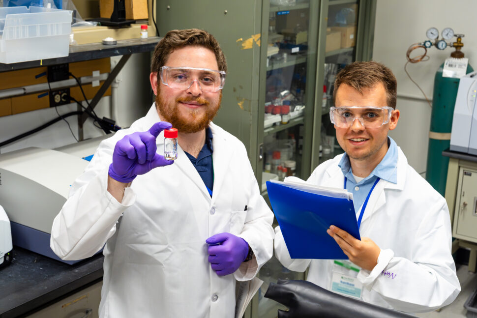 Participants conduct hands-on organic scintillator experiments in a laboratory in Building 6000 during the NSSC Scintillator Summer School.