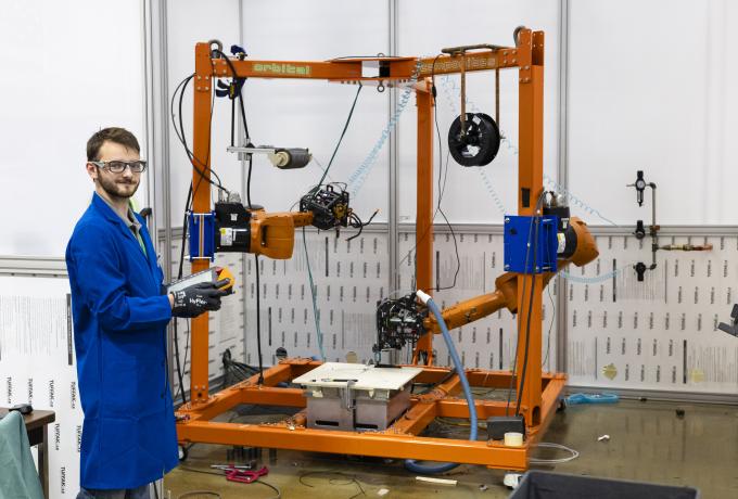 technician pushing a trolley