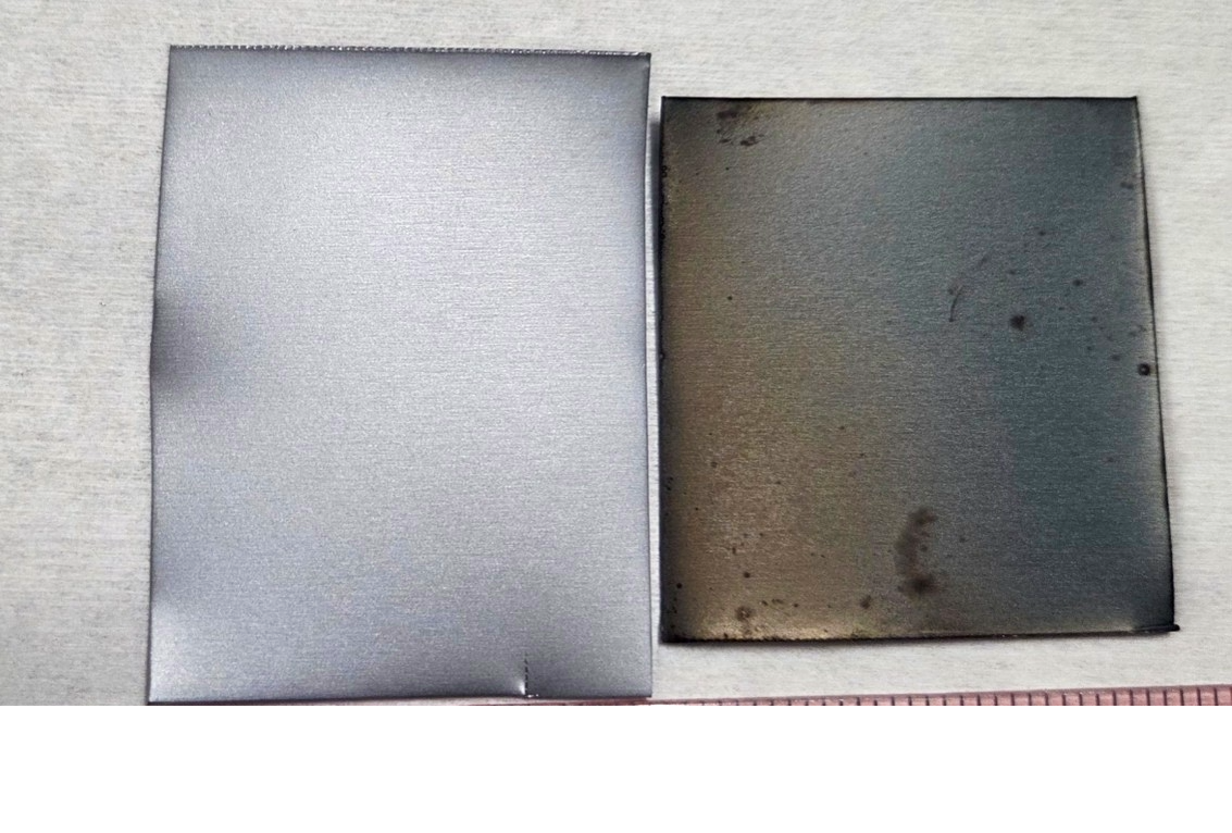 Two pieces of steel side-by-side to demonstrate how impacted steel holds up after exposure to 500C humid air