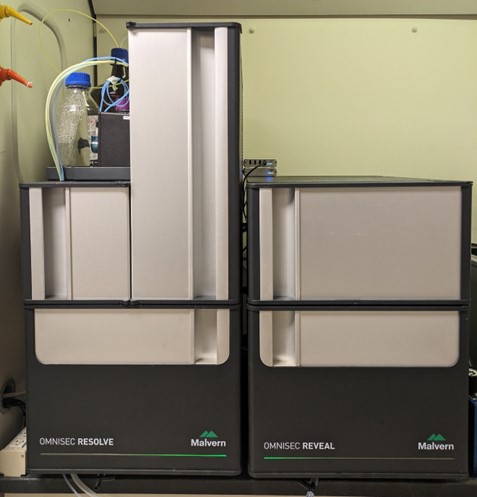 Two refrigerator-like enclosed pieces of equipment, side-by-side