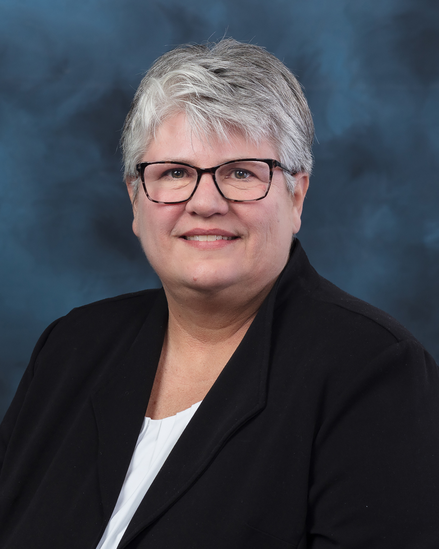 Professional portrait of Jennifer Morrell-Falvey, Group Leader for Radiochemistry and Radiopharmaceutical Production in Molecular & Cellular Imaging, posed indoors in a portrait setting.