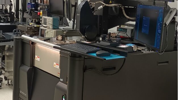 A large, black, printer-sized enclosed piece of equipment