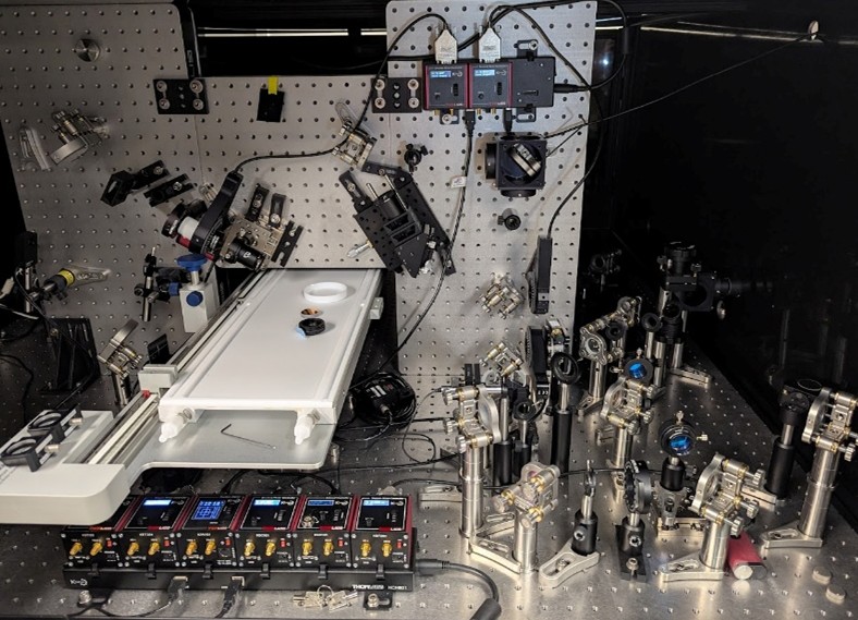 A tabletop cluttered with small equipment 
