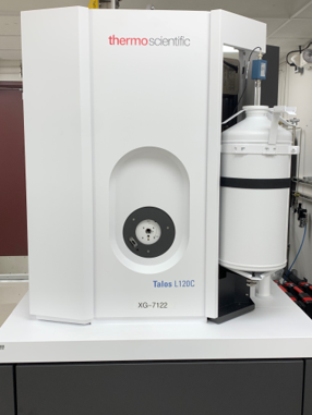 A large boxy white enclosure with a tank on the side