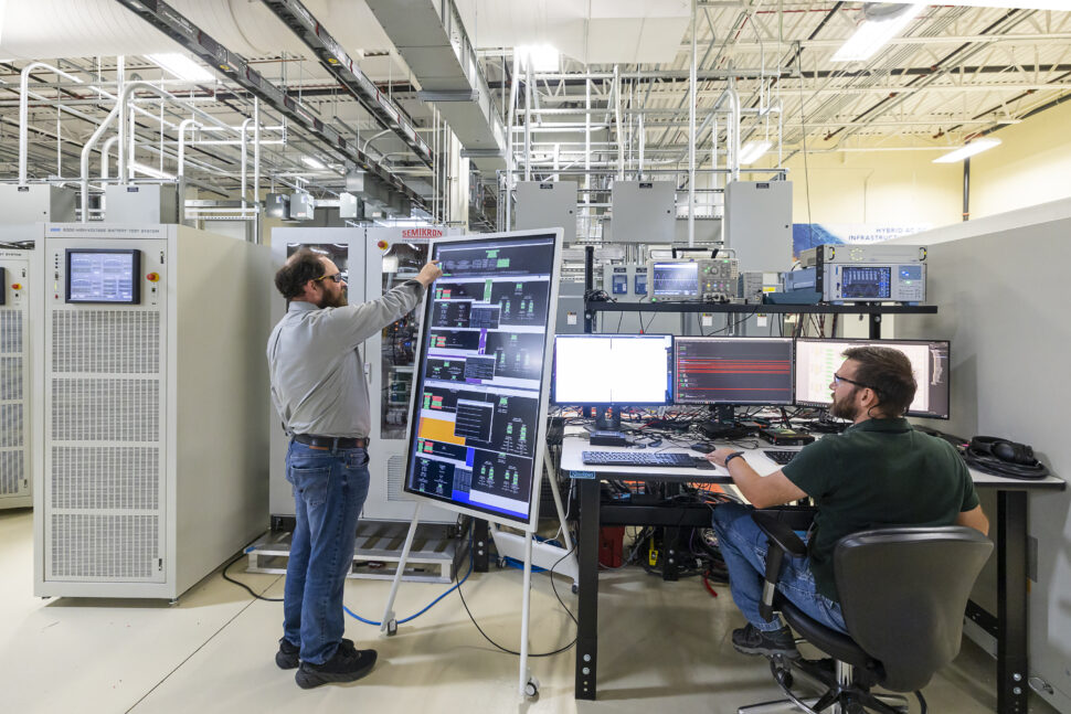 Researchers use equipment at the low voltage lab at GRID-C, Grid Research Integration and Deployment Center.
