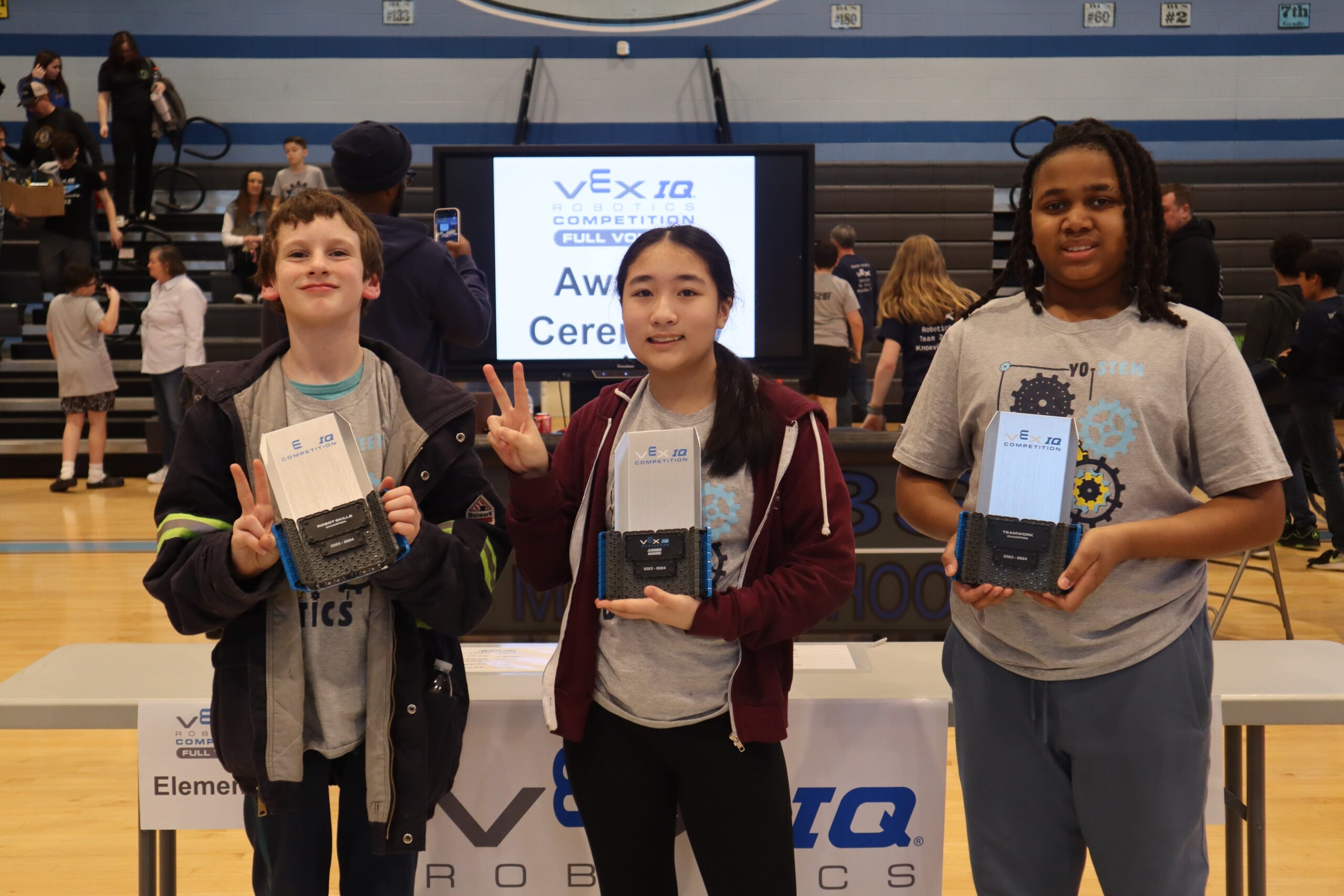 YO-STEM’s Team Radium members show their trophies for scores that placed them in this year’s state robotics competition for middle school. Credit: YO-STEM