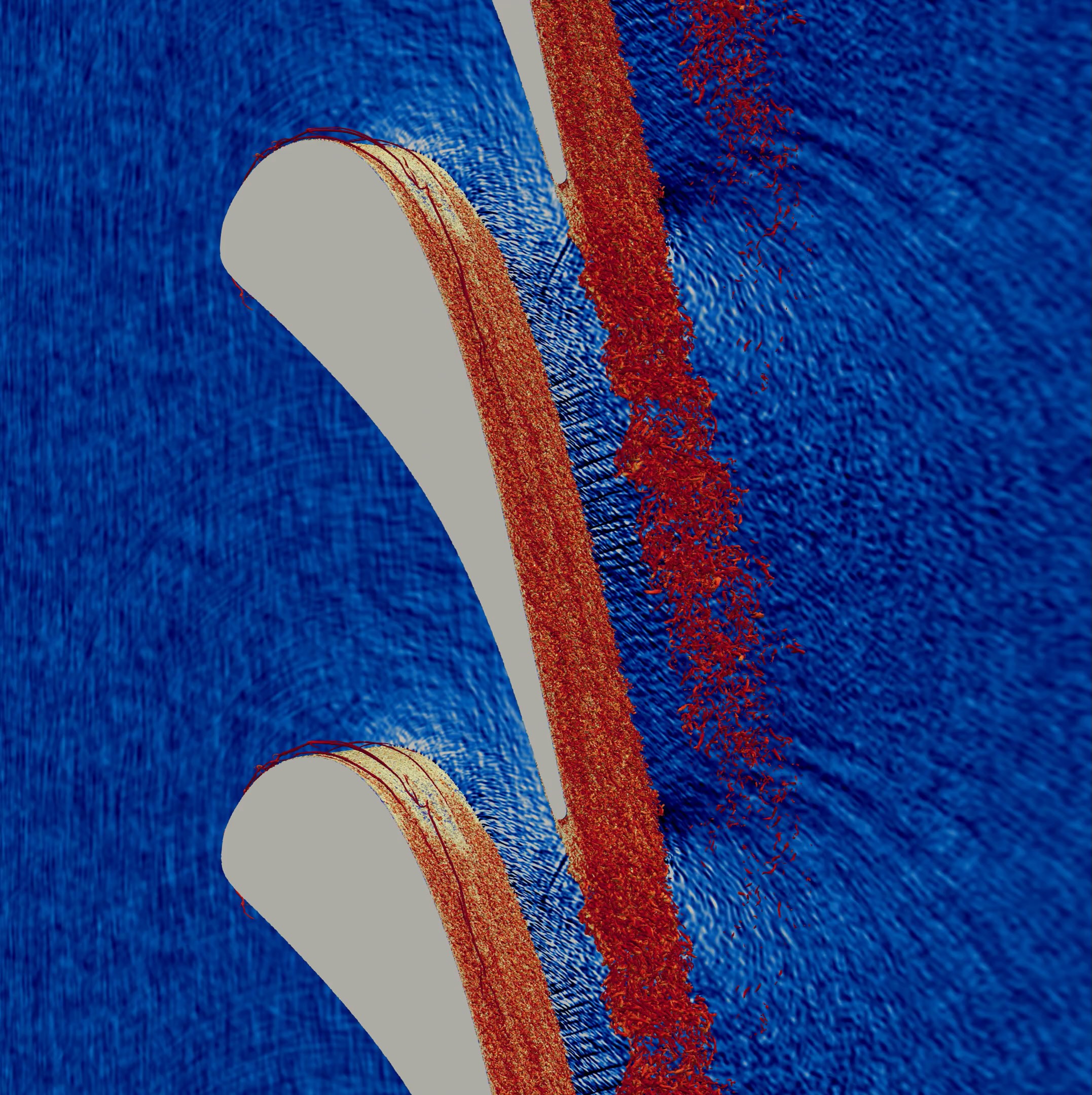 Flow past HPT vane with micron-scale surface roughness at Reynolds number = 590,000 and Mach number = 0.92. Data include instantaneous density gradient (blue) and instantaneous vortical structures (red iso-volumes).