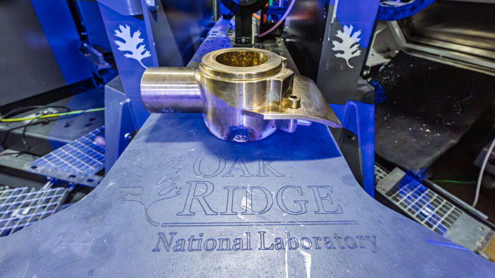 Thomas Feldhausen uses the Future Foundries system with colleagues at ORNL’s Manufacturing Demonstration Facility.