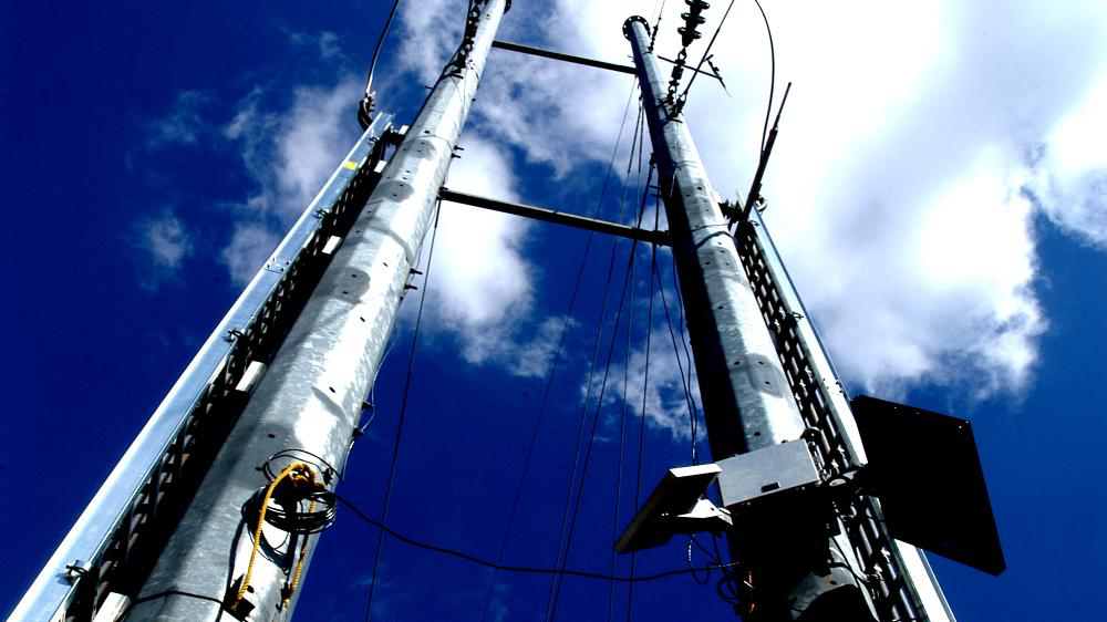 Steel lattice towers used for supporting high-voltage electrical transmission lines at the Oak Ridge National Laboratory's Powerline Conductor Accelerated Testing Facility.