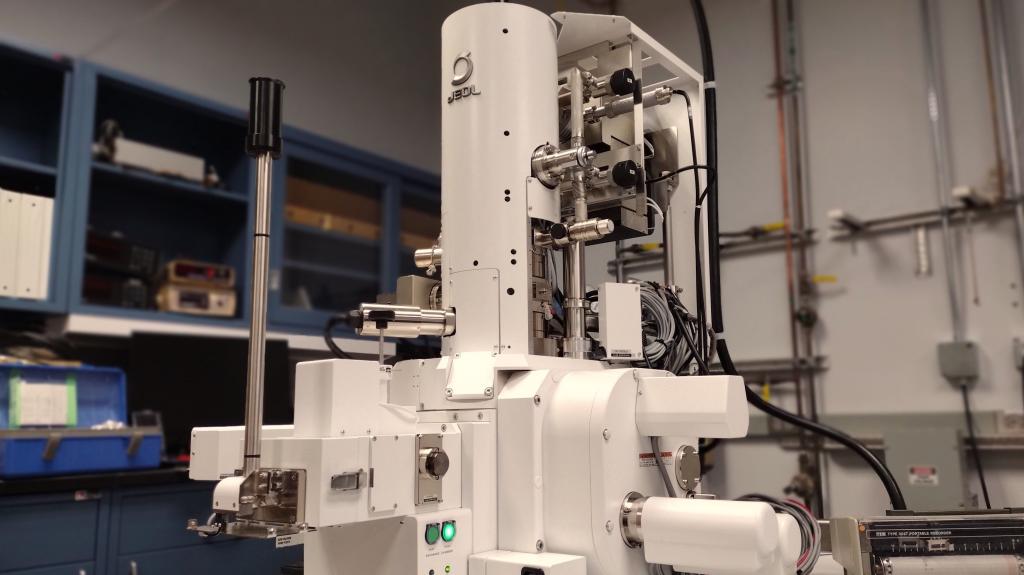 A picture of a microscope in a lab.