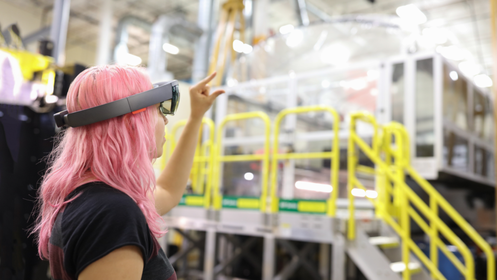 A person wearing augmented reality glasses works in a lab setting at Oak Ridge National Laboratory.