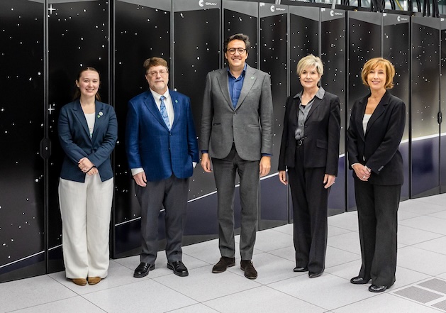 ORNL leadership and DOE Secretary standing in front of the Frontier supercomputer
