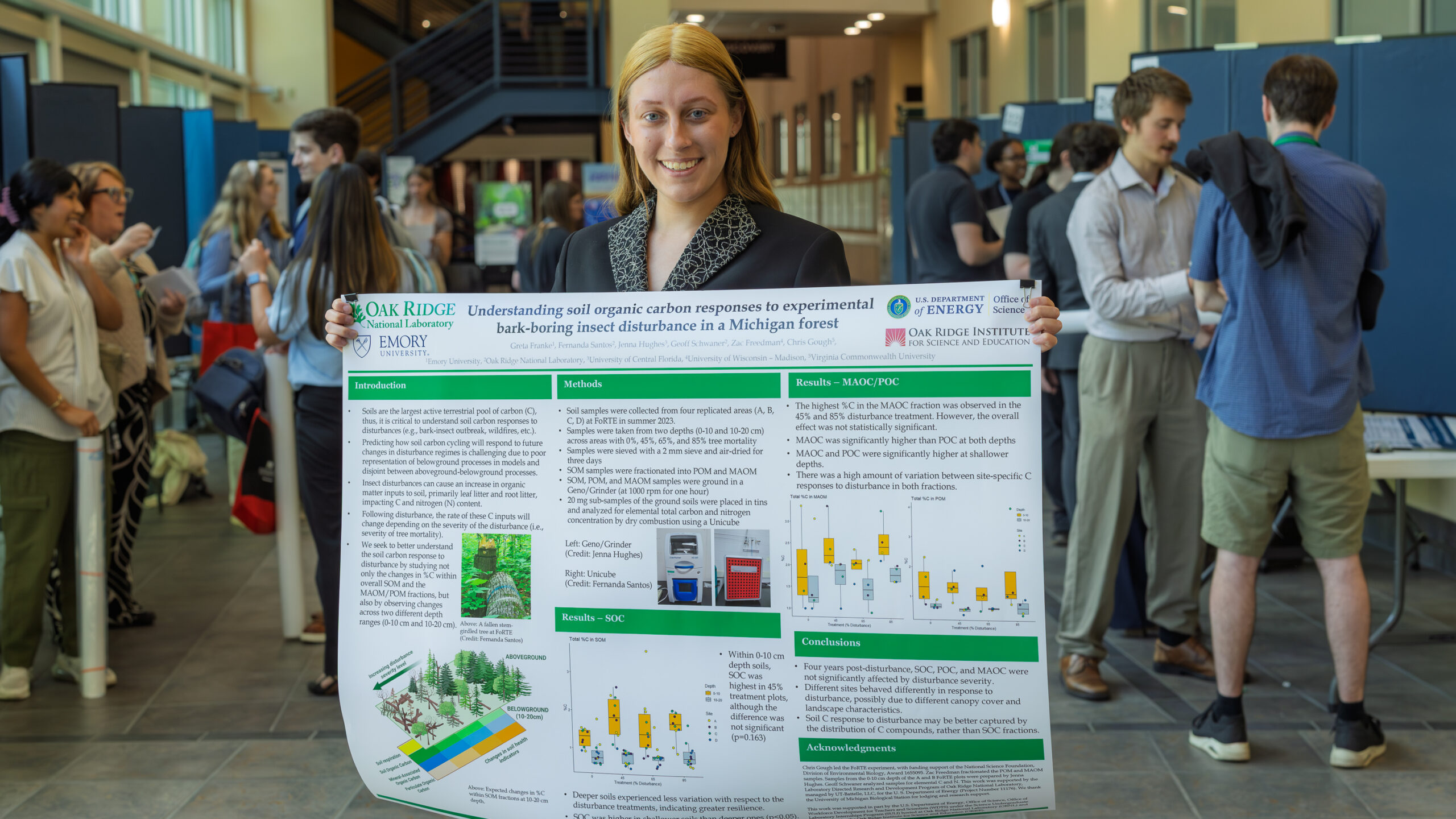 Students present scientific research posters during the Spring 2026 Student Poster Session at Oak Ridge National Laboratory. Attendees gather inside 5700 Main Street to discuss research projects and workforce development opportunities.