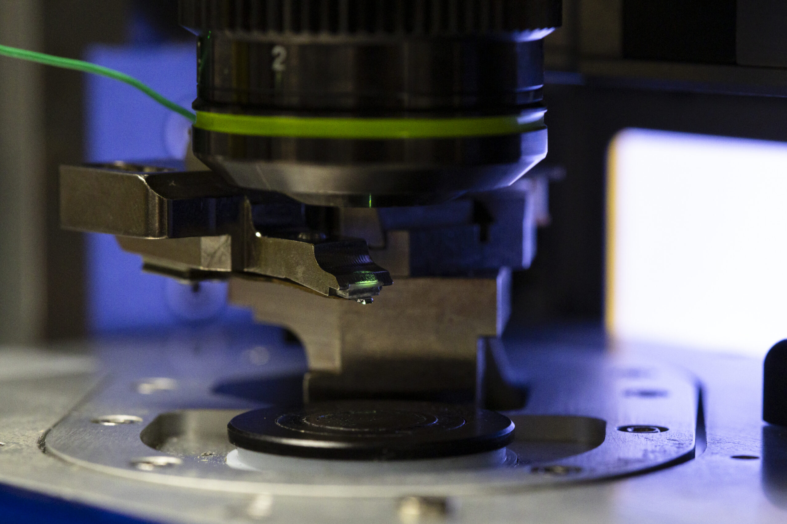 Yongtao Liu uses autonomous scanning probe microscopy equipment in a laboratory at Oak Ridge National Laboratory.