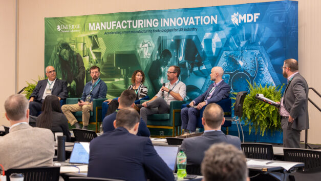 Hydropower experts participate in a panel discussion before an audience at ORNL, addressing manufacturing, supply chain and research needs for the hydropower industry.