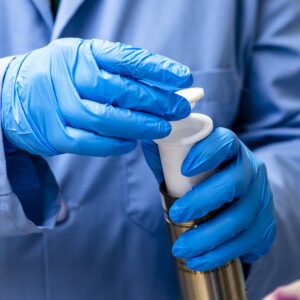 Jayanthi Kumar perform direct lithium extraction from brine samples in a laboratory in Building 4100 at Oak Ridge National Laboratory.