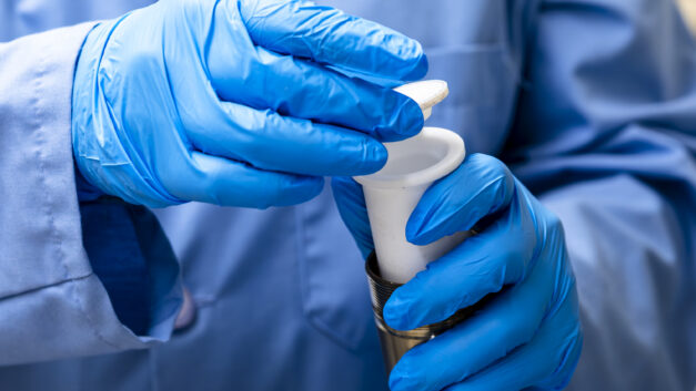 Jayanthi Kumar perform direct lithium extraction from brine samples in a laboratory in Building 4100 at Oak Ridge National Laboratory.