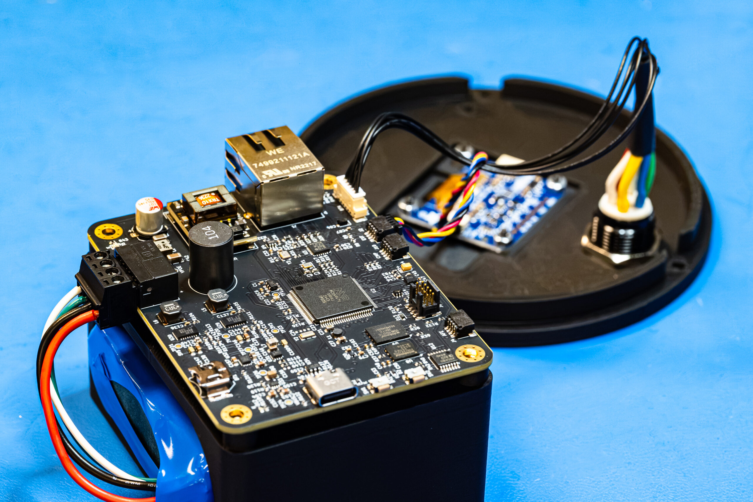 Close-up of the monitoring device’s circuit board and components.
